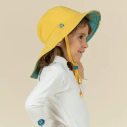 Chapeau Anti UV Bébé Réversible Jaune Et Bleu Imprimé SAVANE -Nabaiji chapeau anti uv bebe reversible jaune et bleu imprime savane 3
